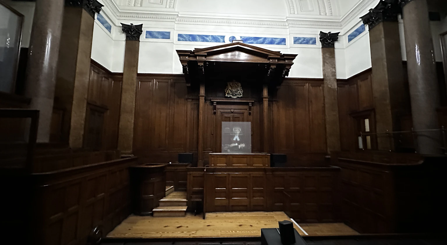 An empty British courtroom — choosing between a disqualification undertaking and a court order, DN Solicitors